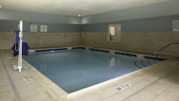Indoor pool, open 7:00 AM to 10:00 PM, pool loungers