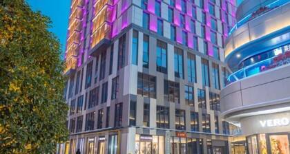 Sweetome Boutique Apartment (Yangzhou Railway Station Jinghua City)