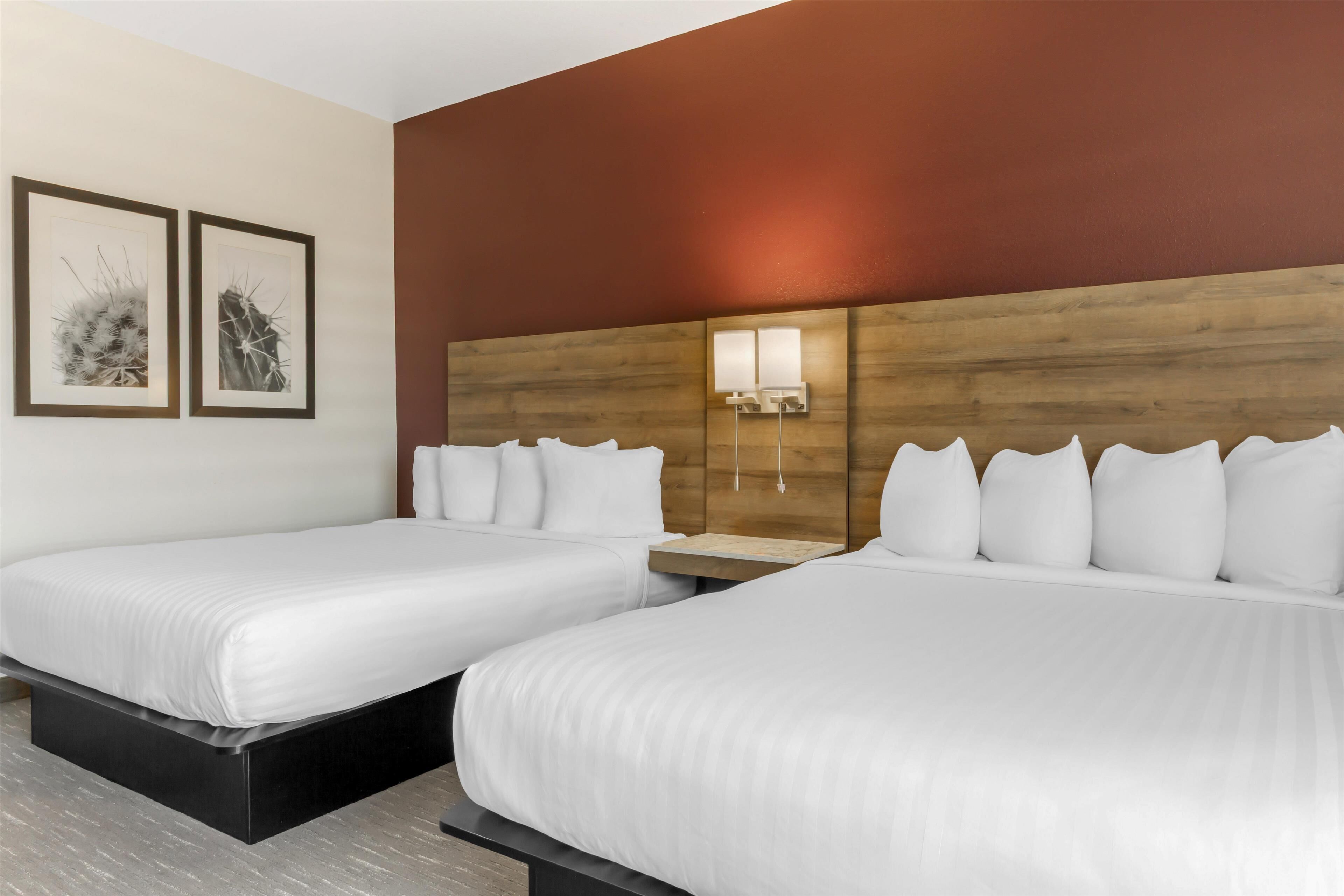 suite, 2 queen beds, accessible, refrigerator & microwave | 1 bedroom, desk, laptop workspace, iron/ironing board