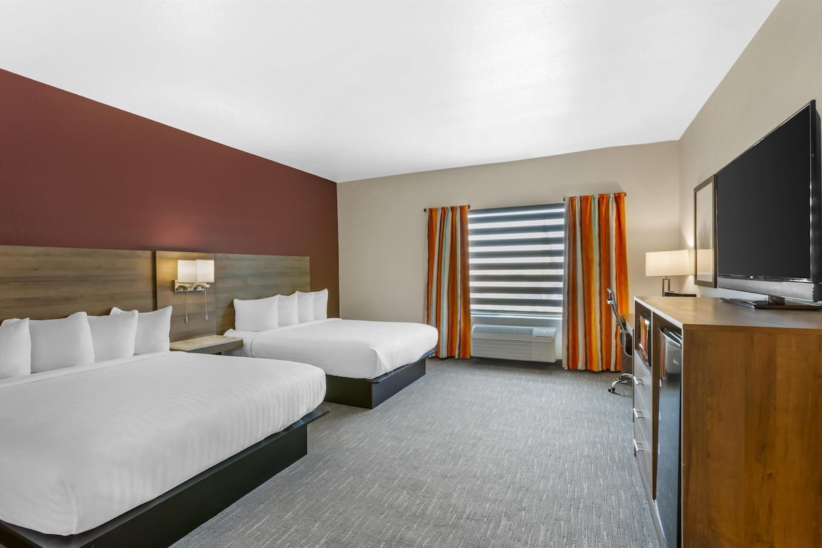 Suite, 2 Queen Beds, Accessible, Refrigerator & Microwave | 1 bedroom, desk, laptop workspace, iron/ironing board