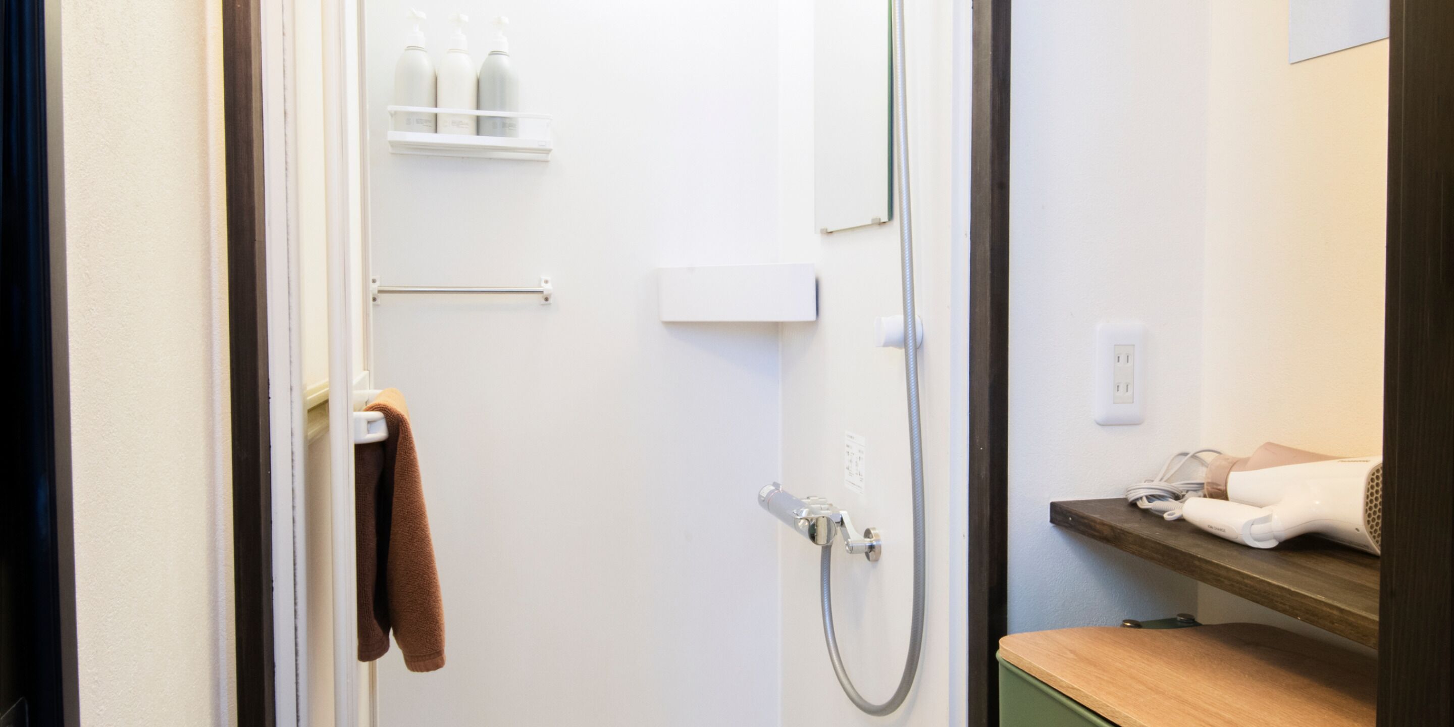 Shower, free toiletries, slippers, towels