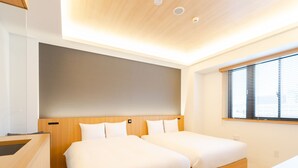 Tomannsrom – executive, ikke-røyk (29sqm, for 4 Guests) | Safe på rommet, skrivebord, wi-fi (inkludert) og sengetøy