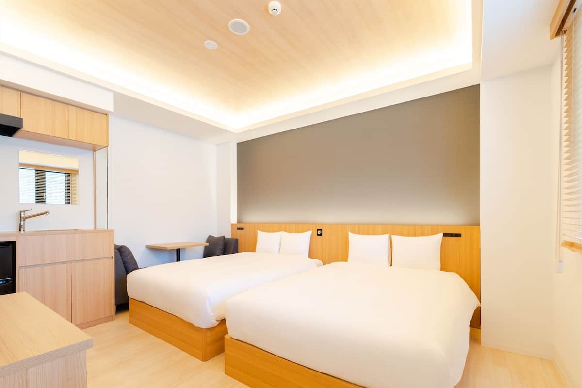 이그제큐티브 트윈룸, 금연 (29sqm, for 4 Guests) | 객실 내 금고, 책상, 무료 WiFi, 침대 시트