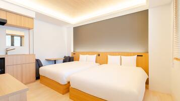 Executive Twin Room, Non Smoking | In-room safe, desk, free WiFi, bed sheets