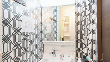 Shower, hair dryer, electronic bidet, towels