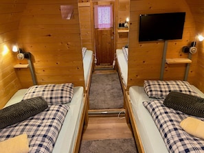 Inn-side adventure cabins | Living area | TV, table tennis