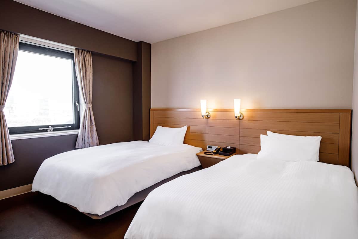 Twin Room, Non Smoking | Iron/ironing board, free WiFi, bed sheets