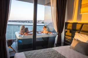 Presidential Suite, Hot Tub, Sea View | Down comforters, memory foam beds, minibar, in-room safe