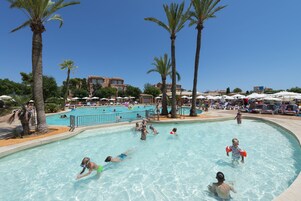 Seasonal outdoor pool, pool umbrellas, sun loungers