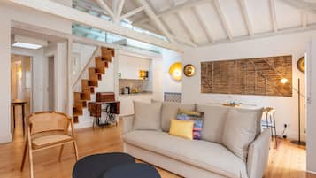 Penthouse, 2 Bedrooms | Living area | 80-cm flat-screen TV with cable channels, LCD TV