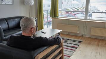 Apartment, 1 Bedroom, Balcony | Living area | 42-inch flat-screen TV with digital channels, TV