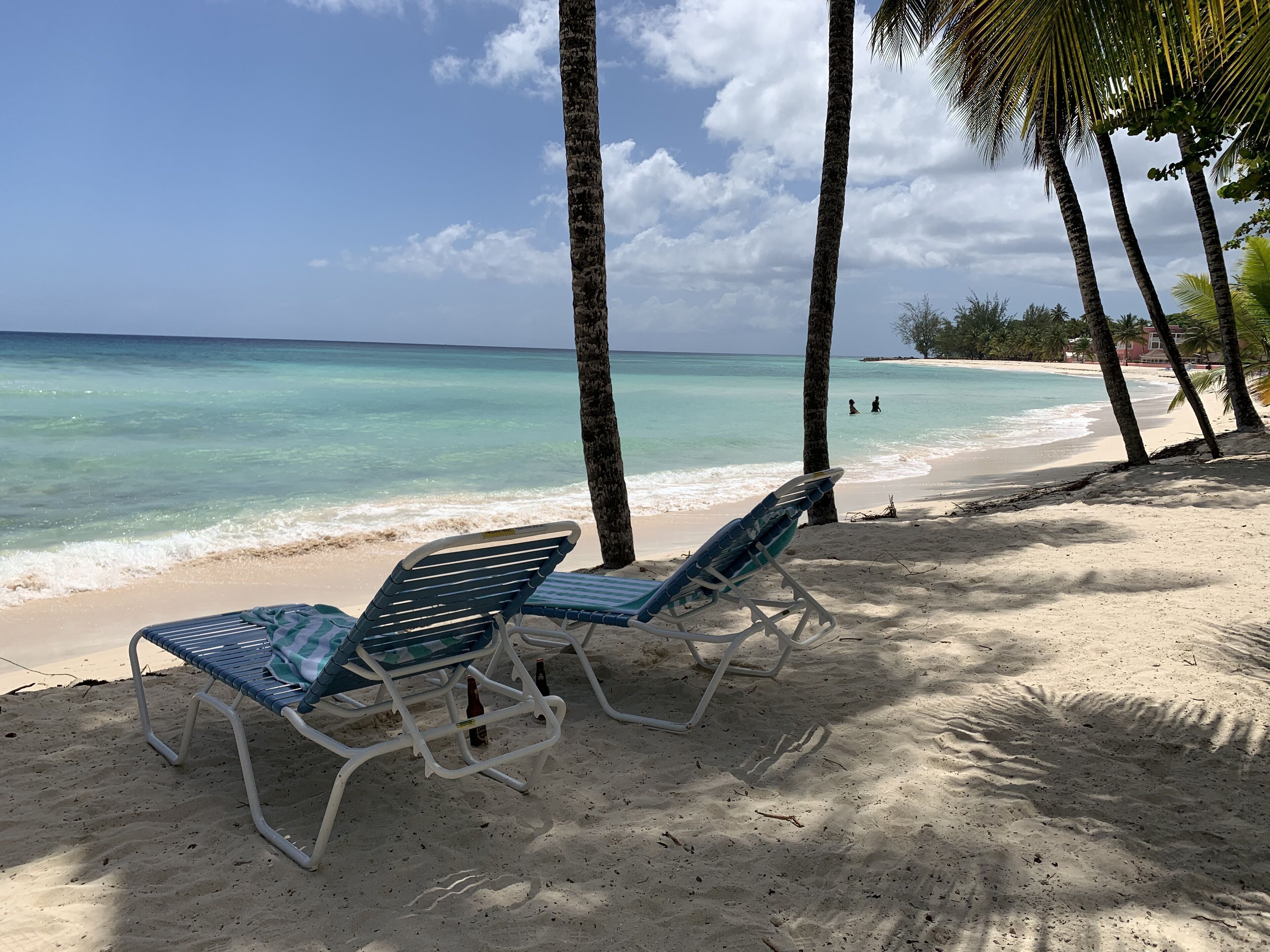 On the beach, sun loungers, beach towels