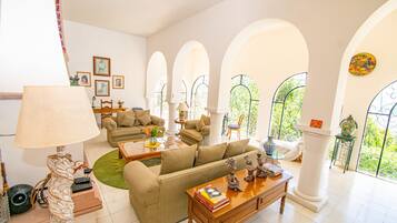 Deluxe Villa | Living area | Flat-screen TV