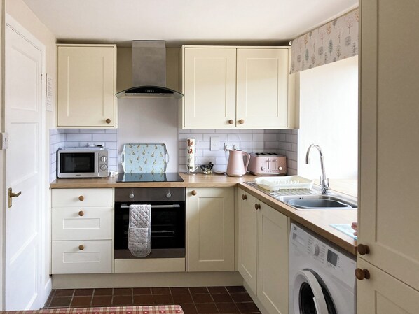 Oven, dishwasher, highchair, cookware/dishes/utensils