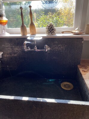 Combined shower/bathtub, hair dryer, towels, toilet paper