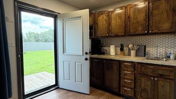 Fridge, microwave, coffee/tea maker, toaster
