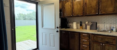 Fridge, microwave, coffee/tea maker, toaster