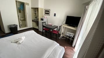 1 bedroom, desk, blackout curtains, iron/ironing board