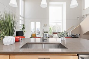 Fridge, microwave, oven, stovetop - Modern Penthouse on Mass By CozySuites (Indianapolis)
