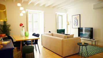 Superior Apartment, 1 Bedroom | Living area | 80-cm flat-screen TV with cable channels, TV