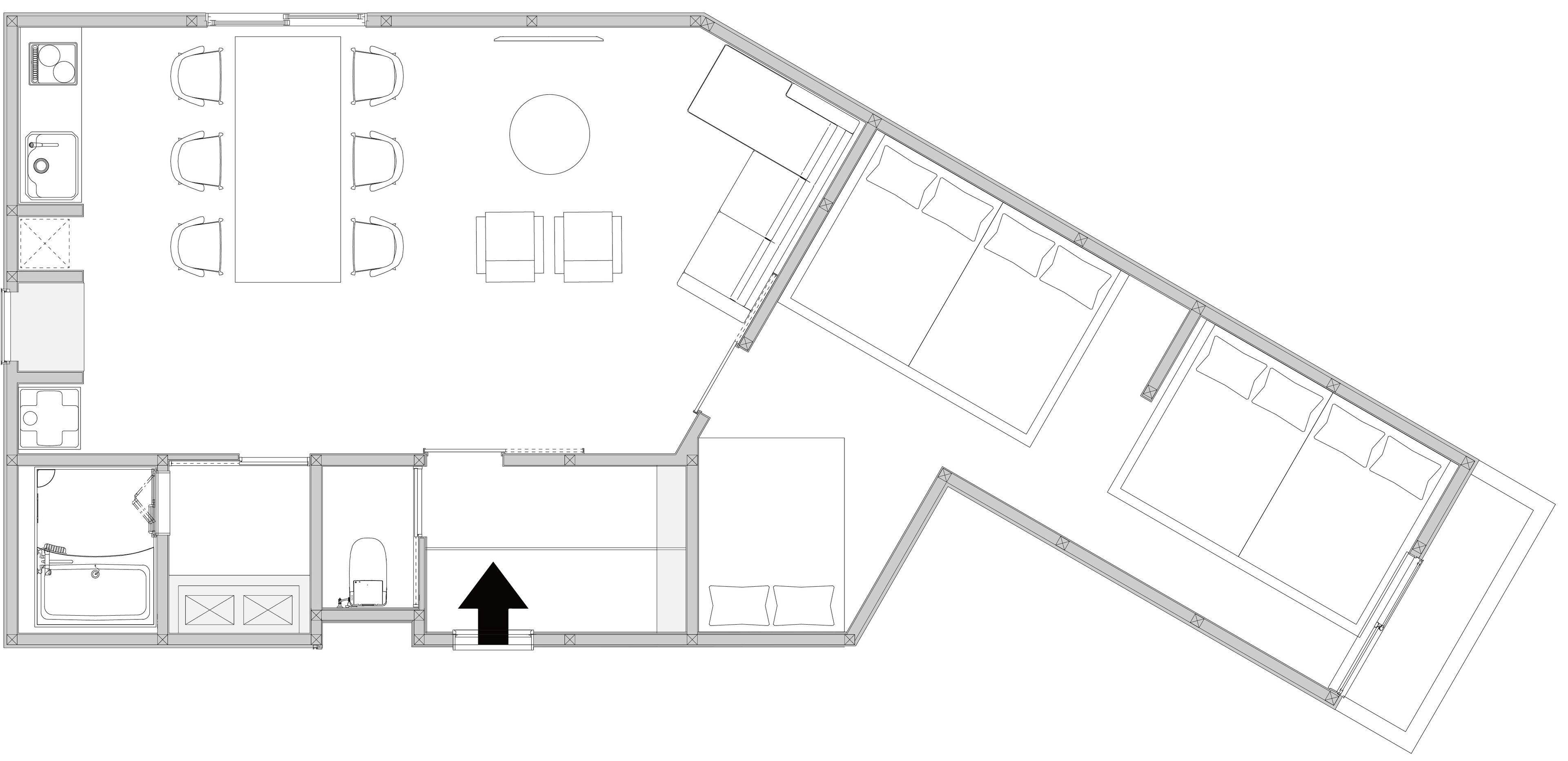 Plano de un hotel que muestra un comedor, varias habitaciones, un baño y una cocina.
