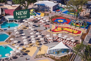 Seasonal outdoor pool, pool umbrellas, pool loungers