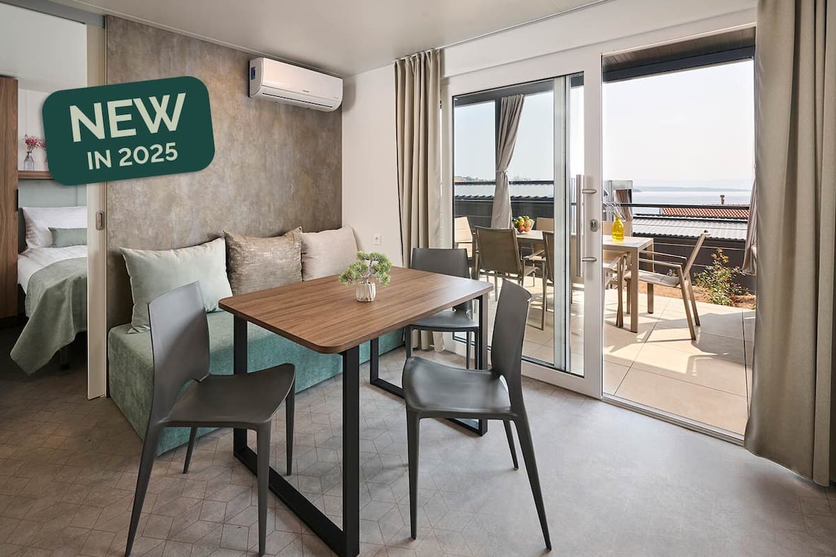 Premium Holiday Home | Living area | 50-inch Smart TV with cable channels