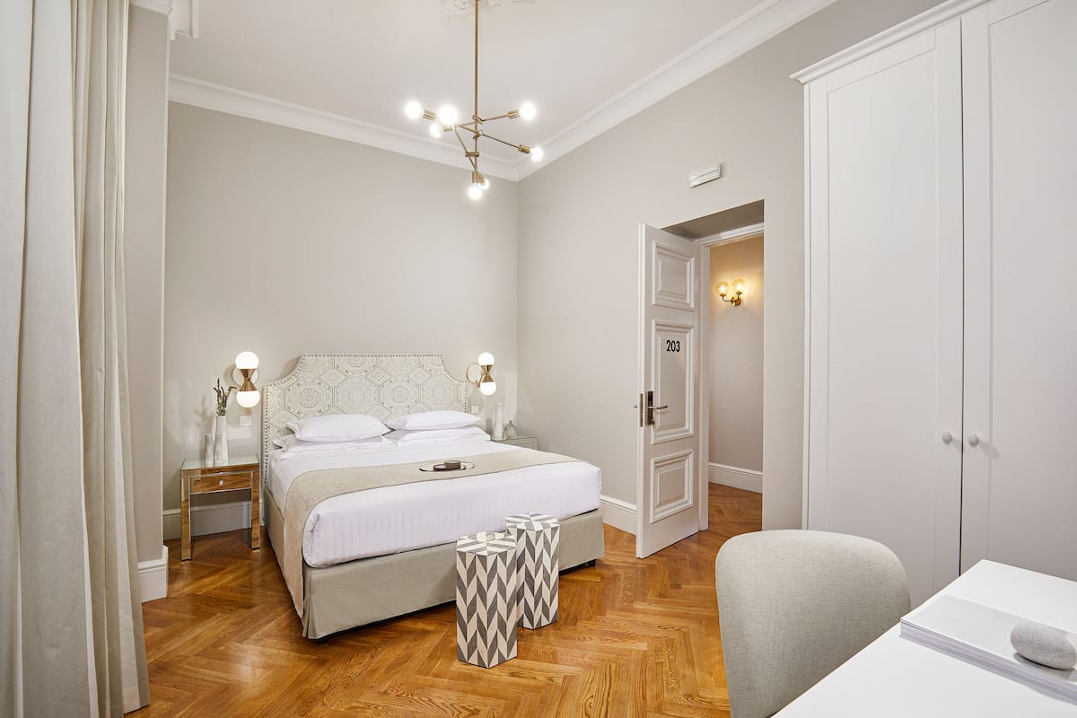 Deluxe Family Room with Balcony | 1 Schlafzimmer, Bettwäsche aus ägyptischer Baumwolle