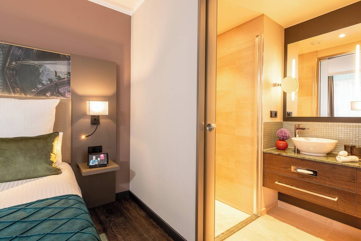 shower, rainfall showerhead, hair dryer, towels