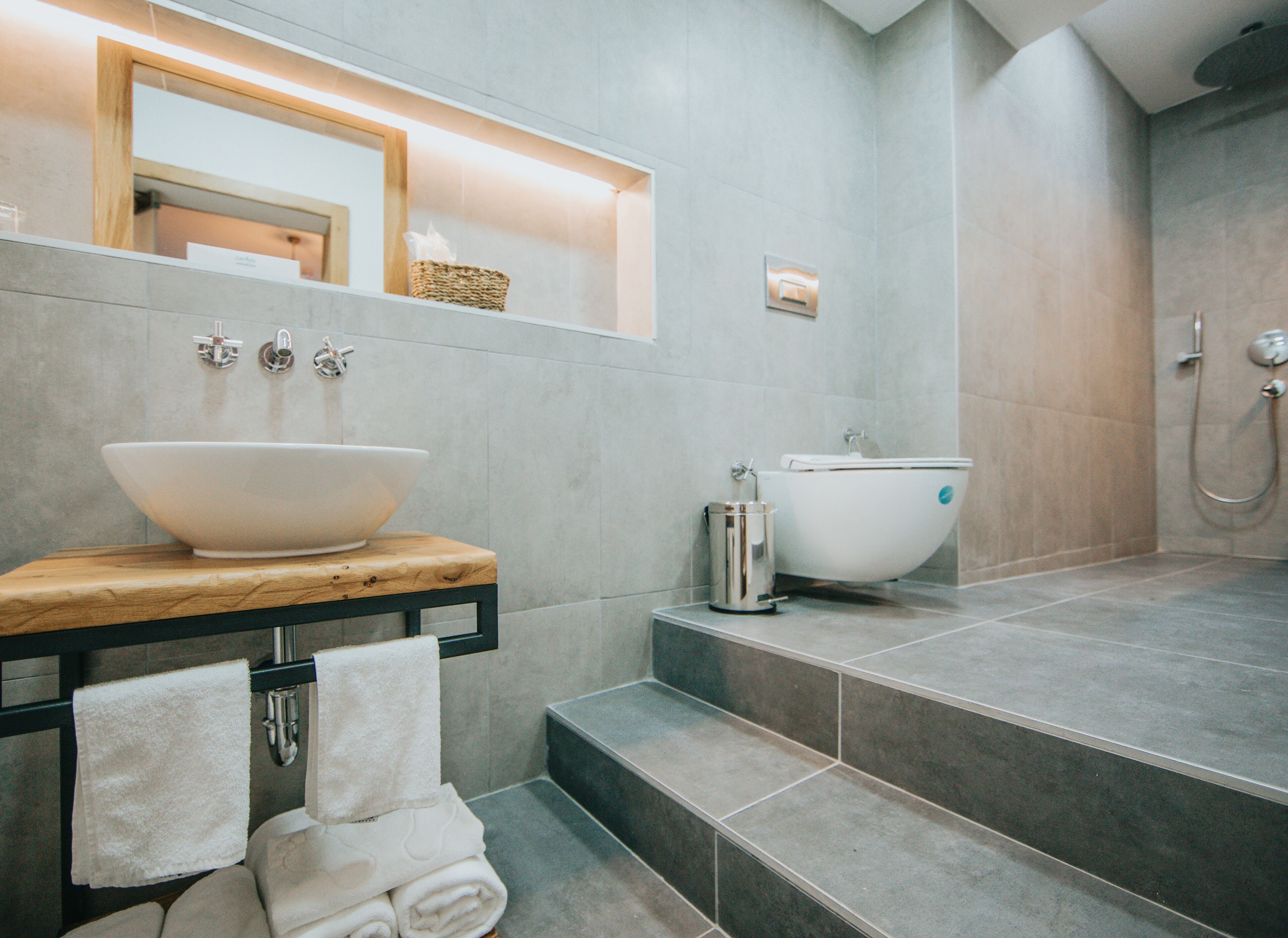 shower, hair dryer, bathrobes, slippers