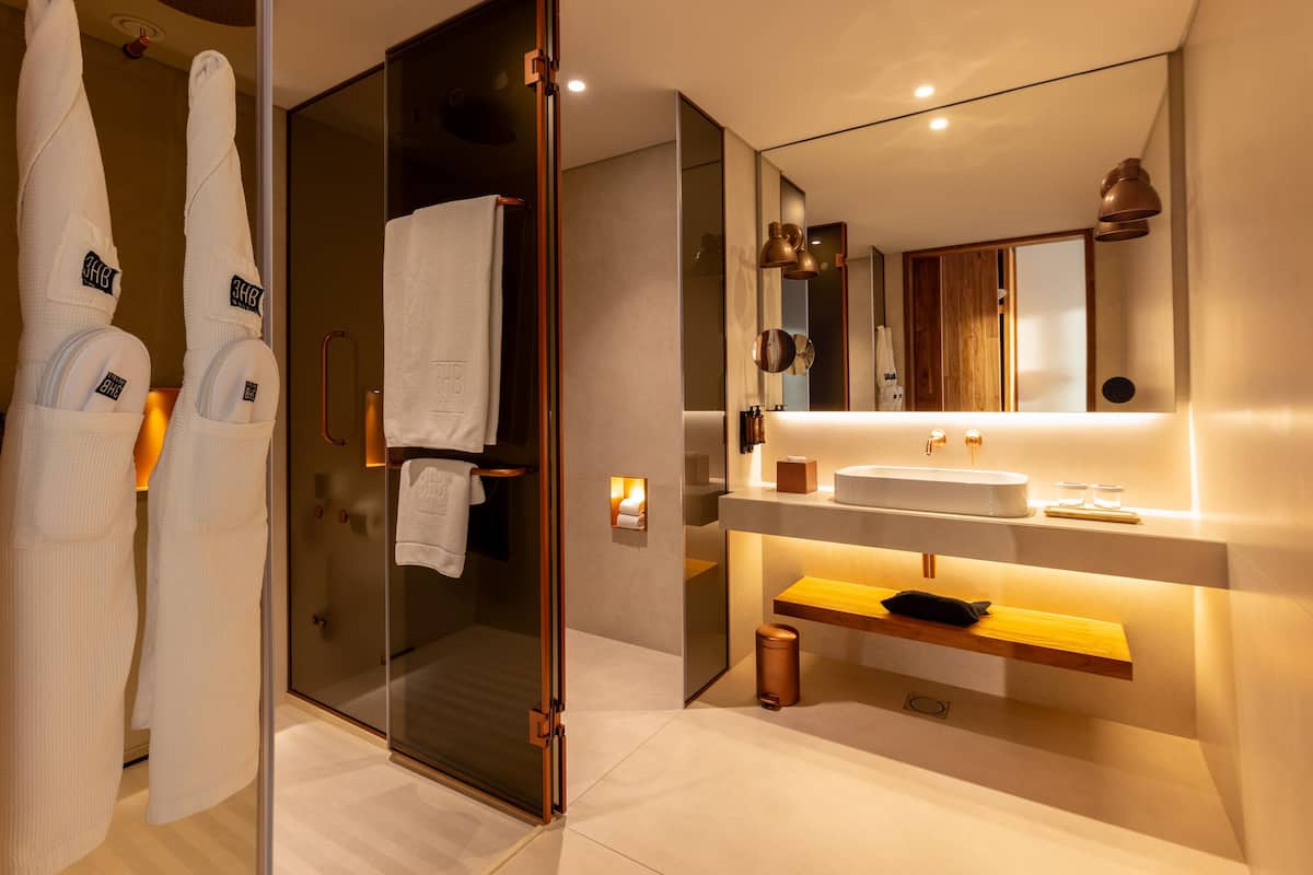 superior suite, jetted tub | bathroom | free toiletries, hair dryer, bathrobes, slippers