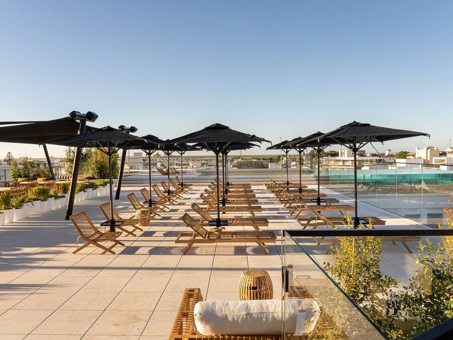 Indoor pool, outdoor pool, pool umbrellas, sun loungers
