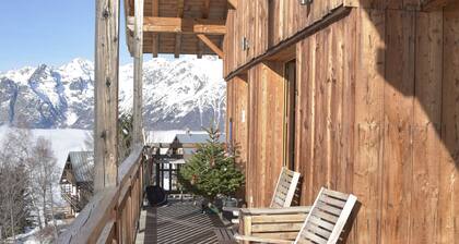 Chalet pied des pistes sauna hammam jacuzzi panorama Gd Domaine ski Alpe d'Huez