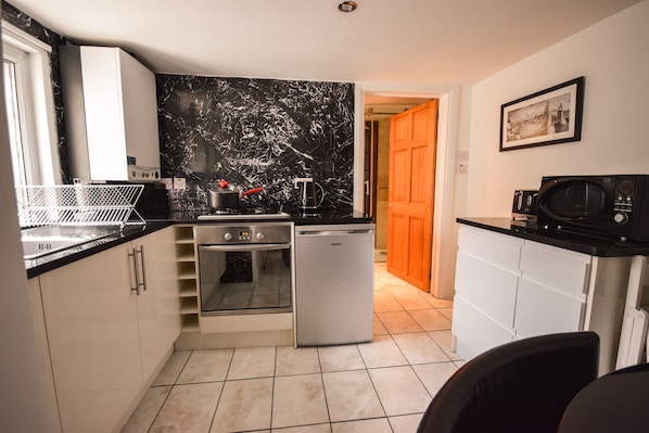 Apartment | Private kitchen | Fridge, microwave, oven, stovetop