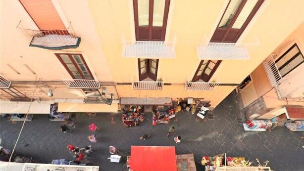 A building with multiple balconies and a courtyard. - Sorrento Historical Center (Sorrento)