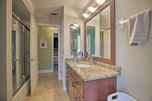 Combined shower/tub, hair dryer, towels, soap