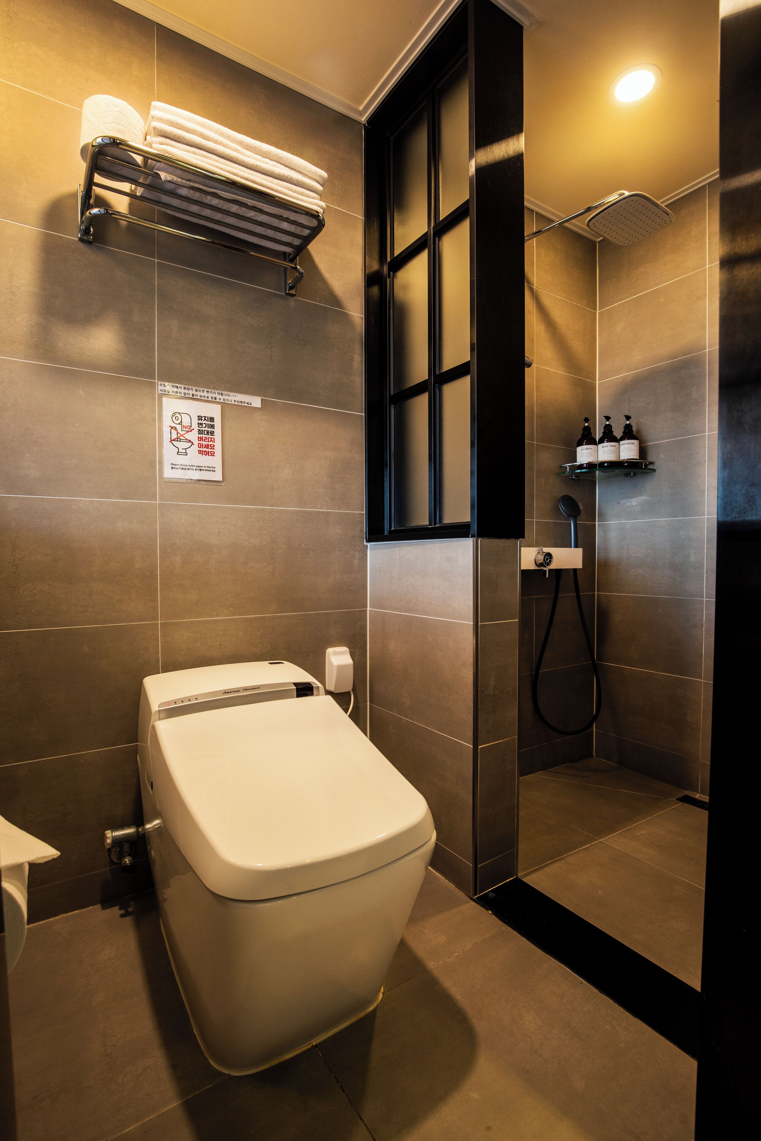 hair dryer, slippers, bidet, towels