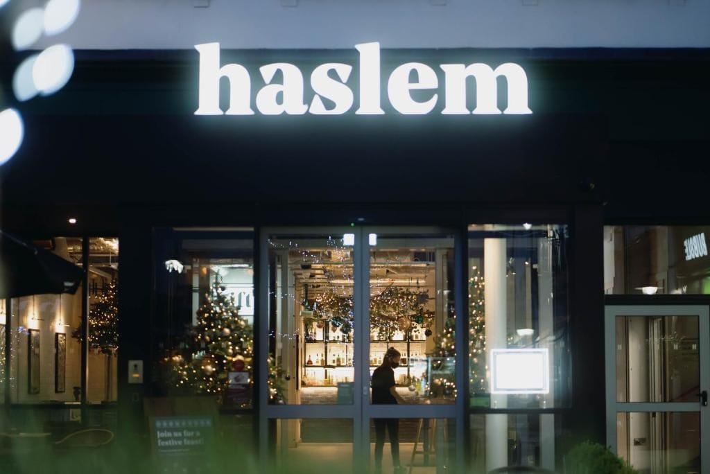 A storefront with a prominent sign reading 'haslem.'