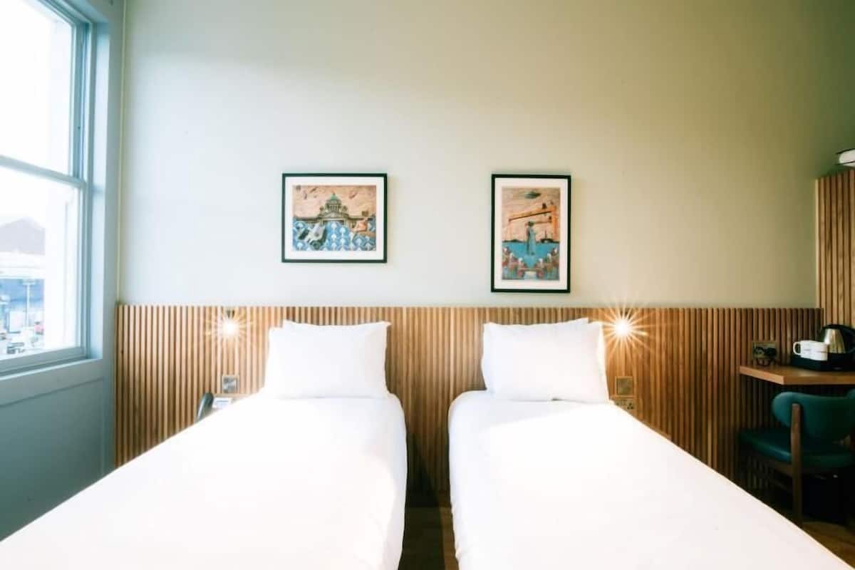 Twin Room, 1 Bedroom | In-room safe, soundproofing, iron/ironing board, free WiFi