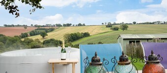 NEW Barn Conversion. Idyllic and unspoiled views complete with Hot Tub & Fire