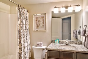 Bathtub, hair dryer, towels