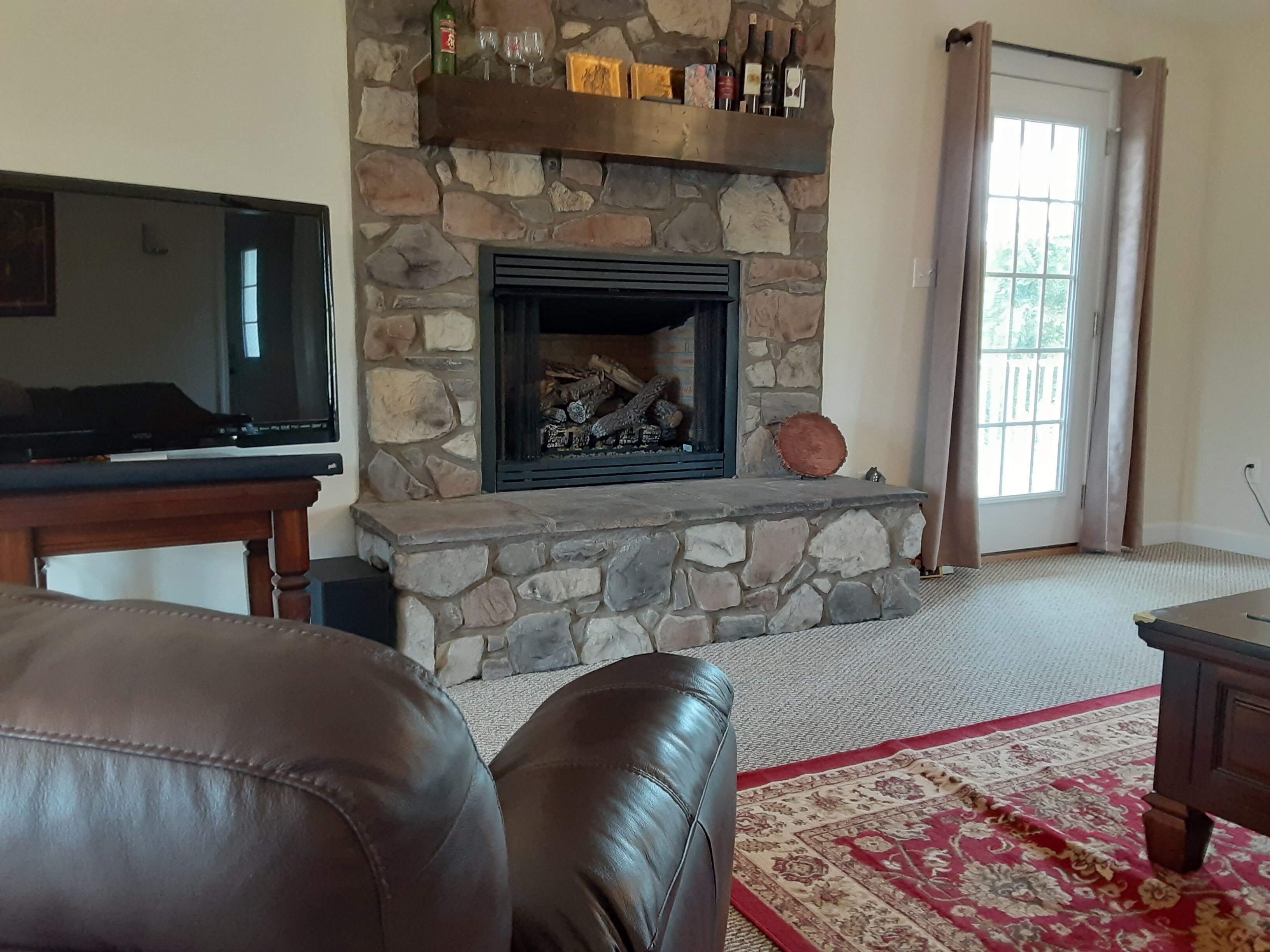 Welcome Home! New luxurious home awaits - large family room w/ fireplace. 