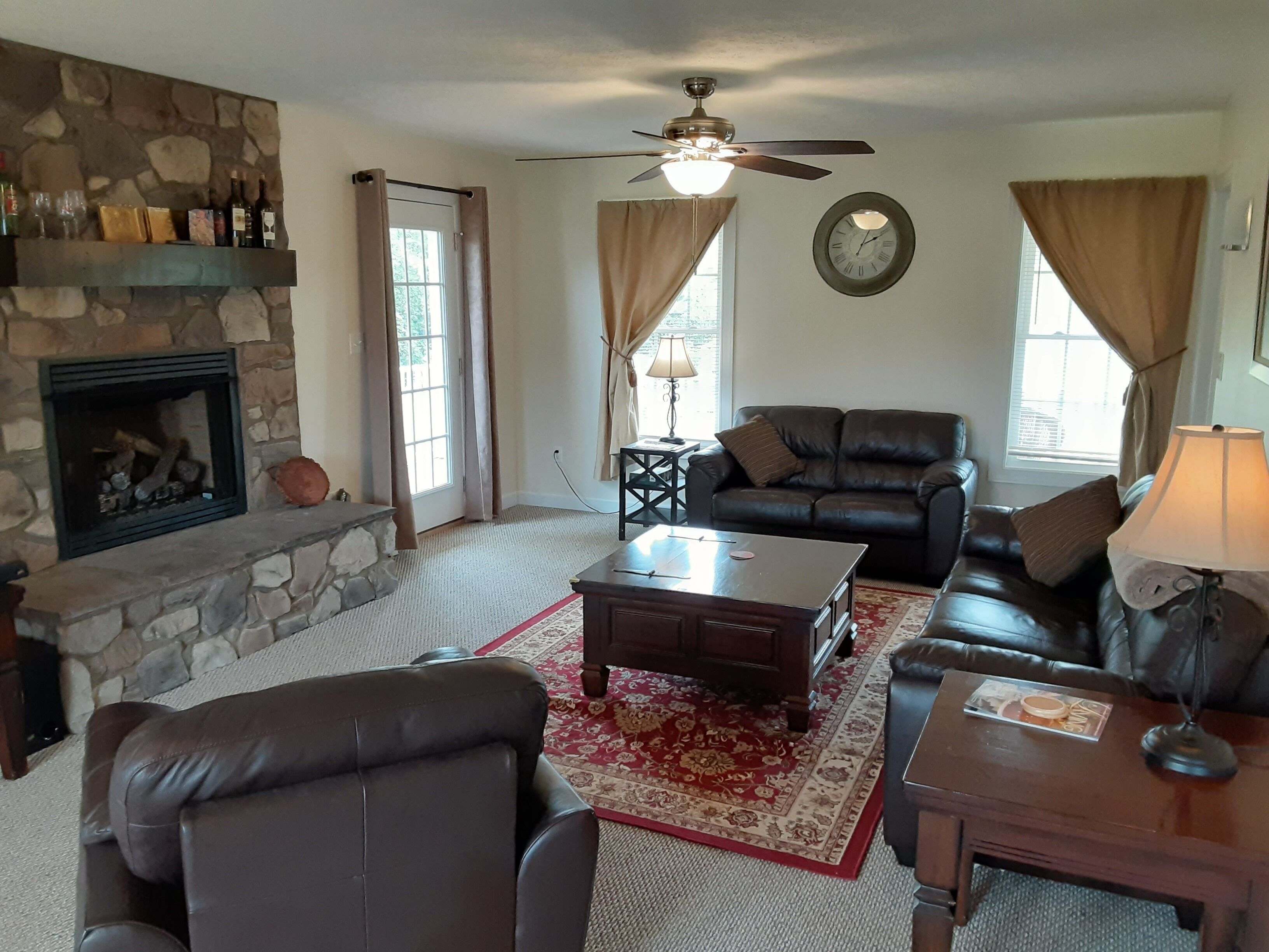 Welcome Home! New luxurious home awaits - large family room w/ fireplace. 