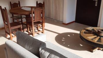 Family Apartment | Living room | 32-inch flat-screen TV with cable channels, Smart TV