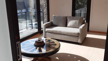 Family Apartment | Living room | 32-inch flat-screen TV with cable channels, Smart TV