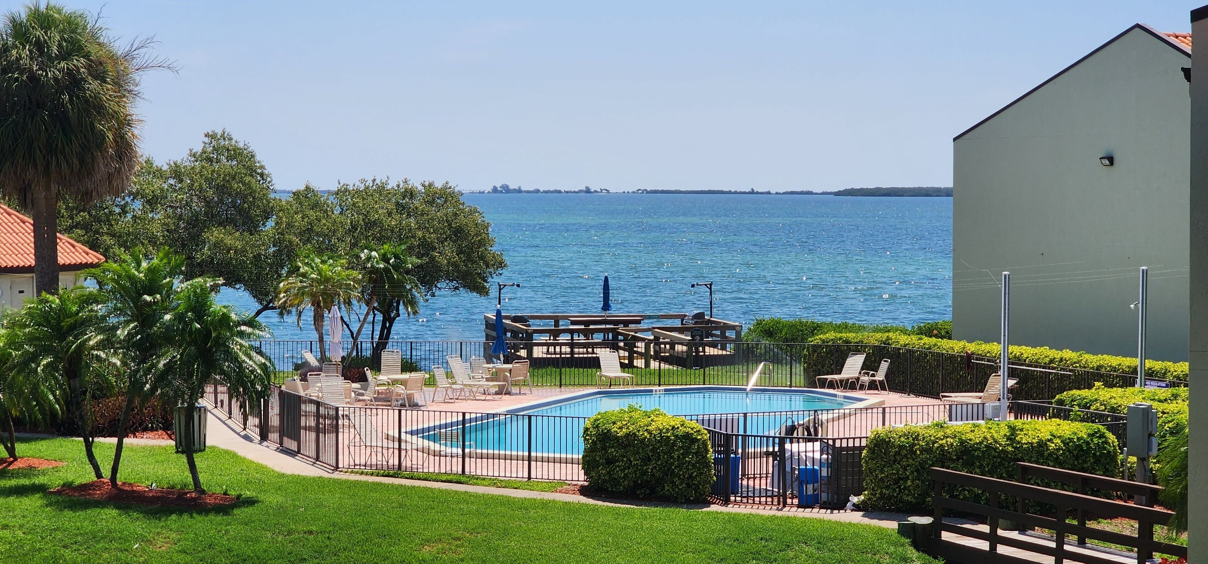 Welcome to the island lifestyle ! Gorgeous 2 BR, 1st floor, waterfront condo
