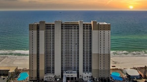 A high-rise hotel with a pool and beach view. - Gulf Front PH •Free Chairs• Best Views in PCB (Panama City Beach)