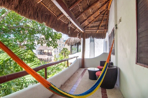 You’ll love relaxing in the woven hammock