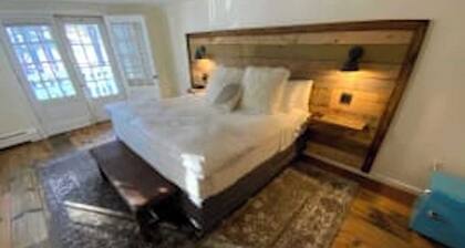 Luxury King Suite, Living Room w/sofa bed, balcony, & 1.5 baths