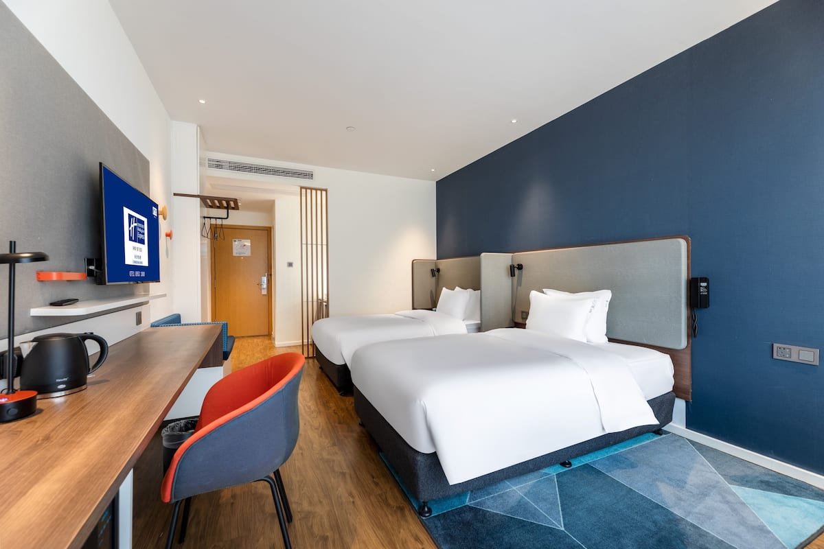 Standard Room, 2 Twin Beds, City View | In-room safe, desk, laptop workspace, blackout drapes